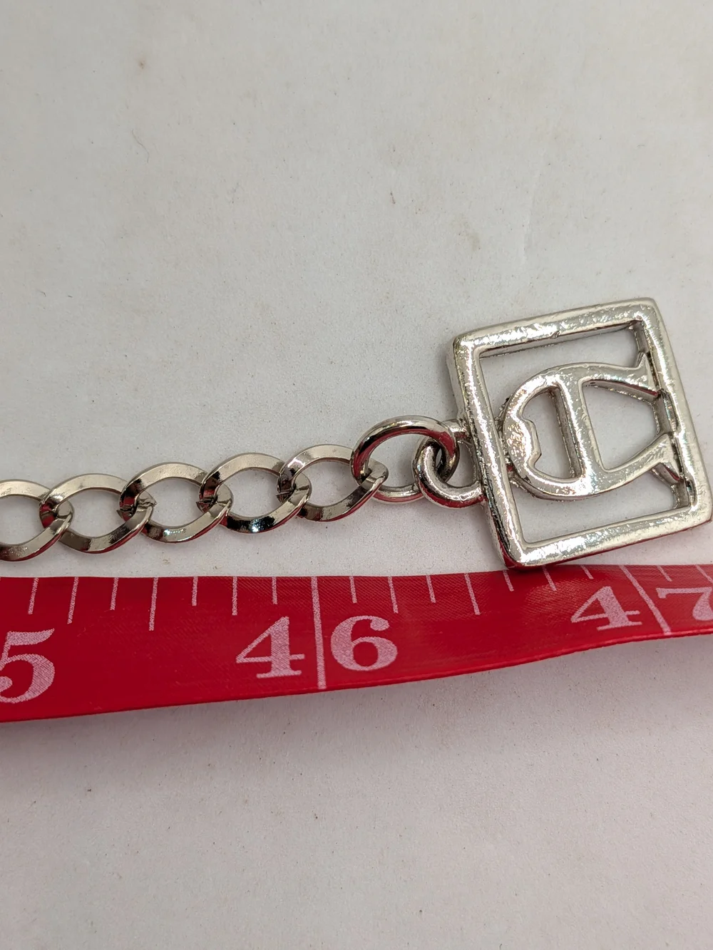 Etienne Aigner elegant silver